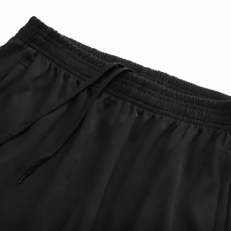 Kit da allenamento Liverpool con cerniera 1/4 per bambini (giacca+pantaloni) 2025/26 - Verde