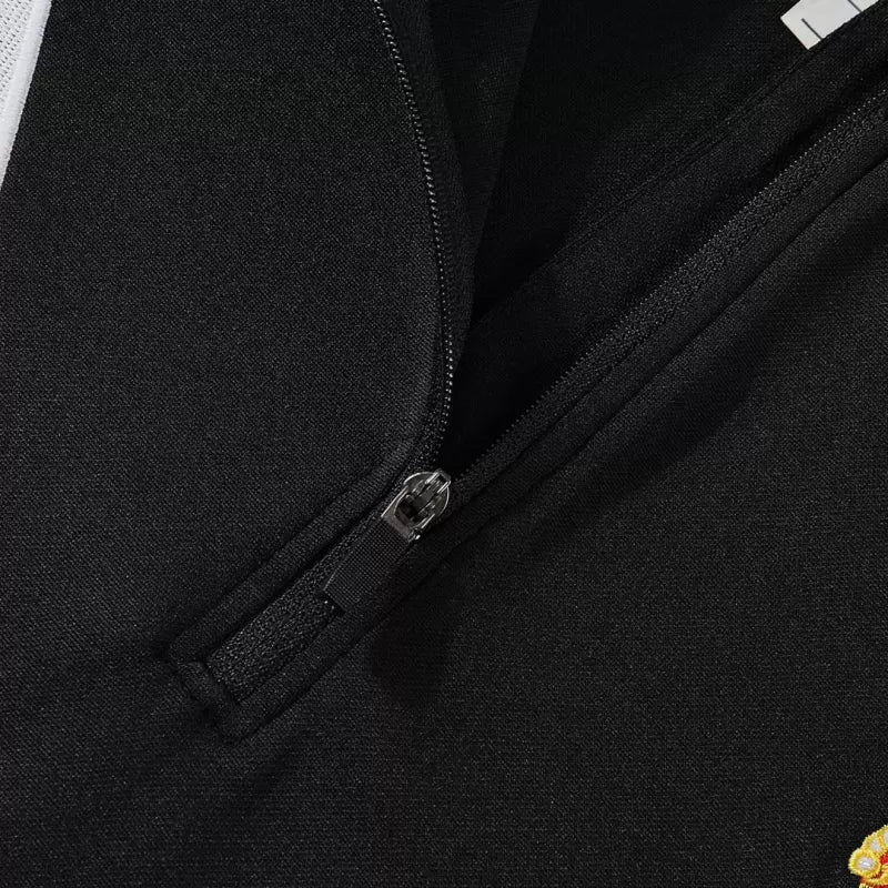 Tuta Real Madrid con zip 1/4 (giacca+pantaloni) 2025/26 - Nera