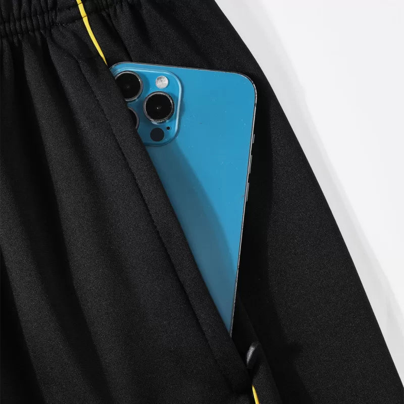 Tuta Real Madrid con zip 1/4 (giacca+pantaloni) 2025/26 - Nera