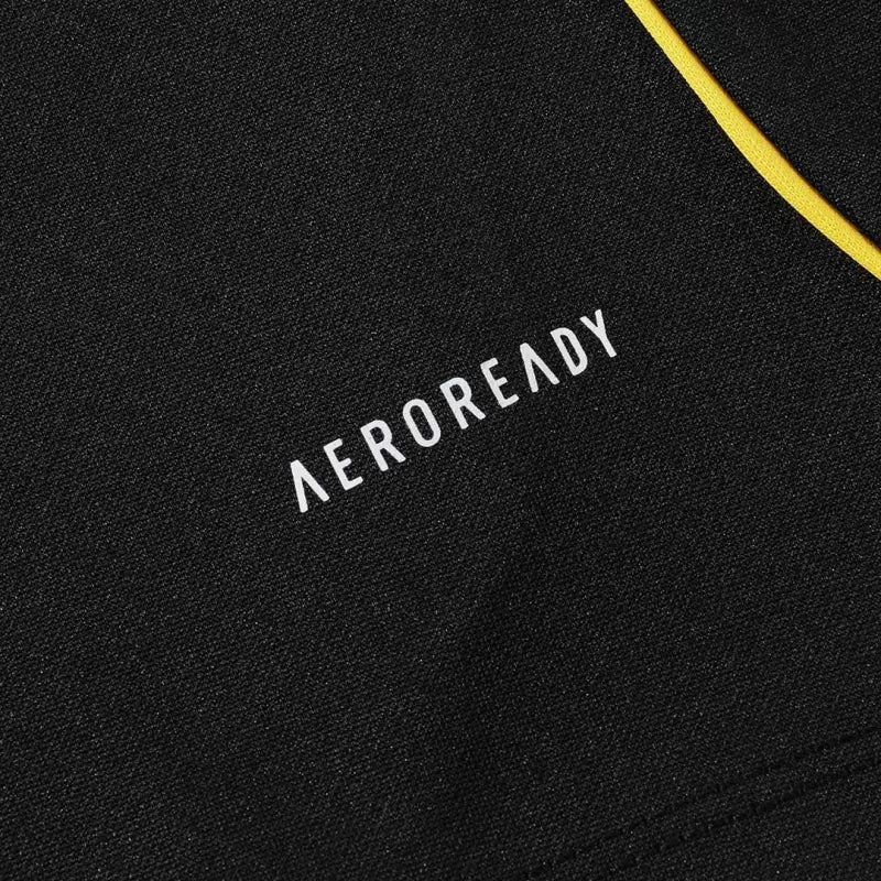 Tuta Real Madrid con zip 1/4 (giacca+pantaloni) 2025/26 - Nera