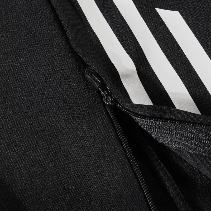 Tuta Real Madrid con zip 1/4 (giacca+pantaloni) 2025/26 - Nera