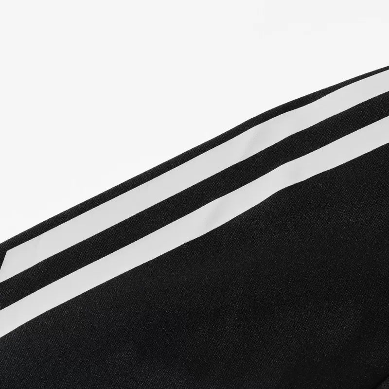 Tuta Real Madrid con zip 1/4 (giacca+pantaloni) 2025/26 - Nera