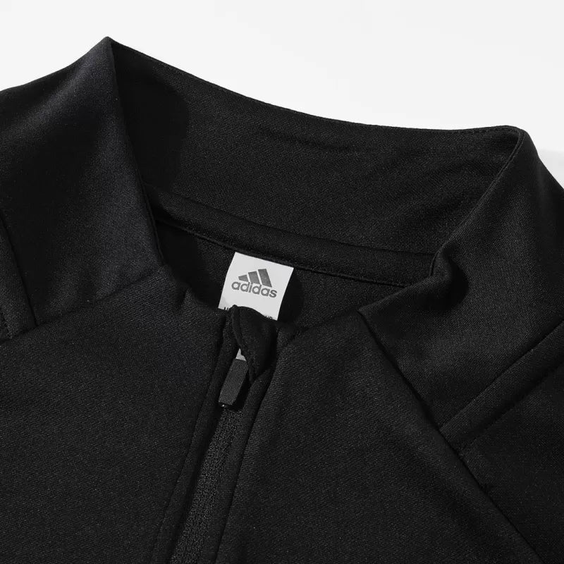 Tuta Real Madrid con zip 1/4 (giacca+pantaloni) 2025/26 - Nera