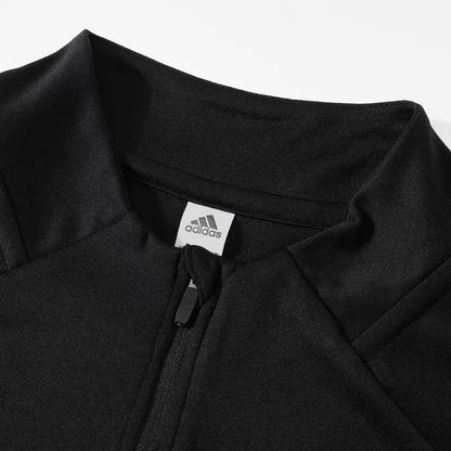 Tuta Real Madrid con zip 1/4 (giacca+pantaloni) 2025/26 - Nera