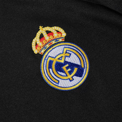 Tuta Real Madrid con zip 1/4 (giacca+pantaloni) 2025/26 - Nera