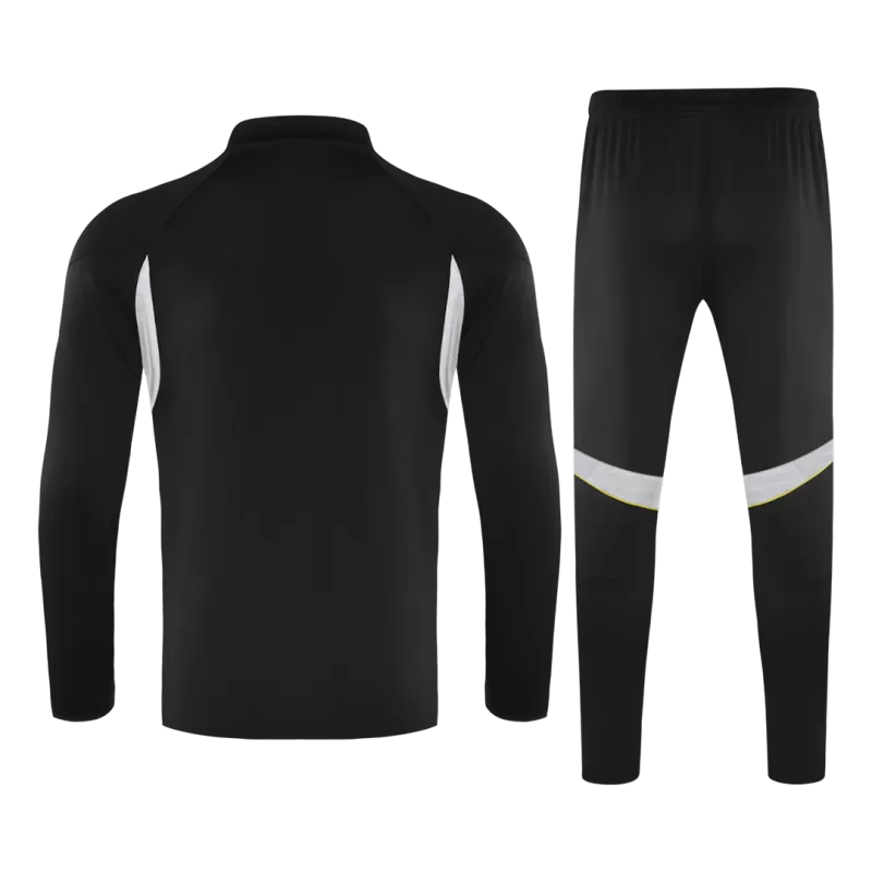 Tuta Real Madrid con zip 1/4 (giacca+pantaloni) 2025/26 - Nera