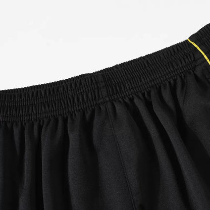 Tuta Real Madrid con zip 1/4 (giacca+pantaloni) 2025/26 - Nera